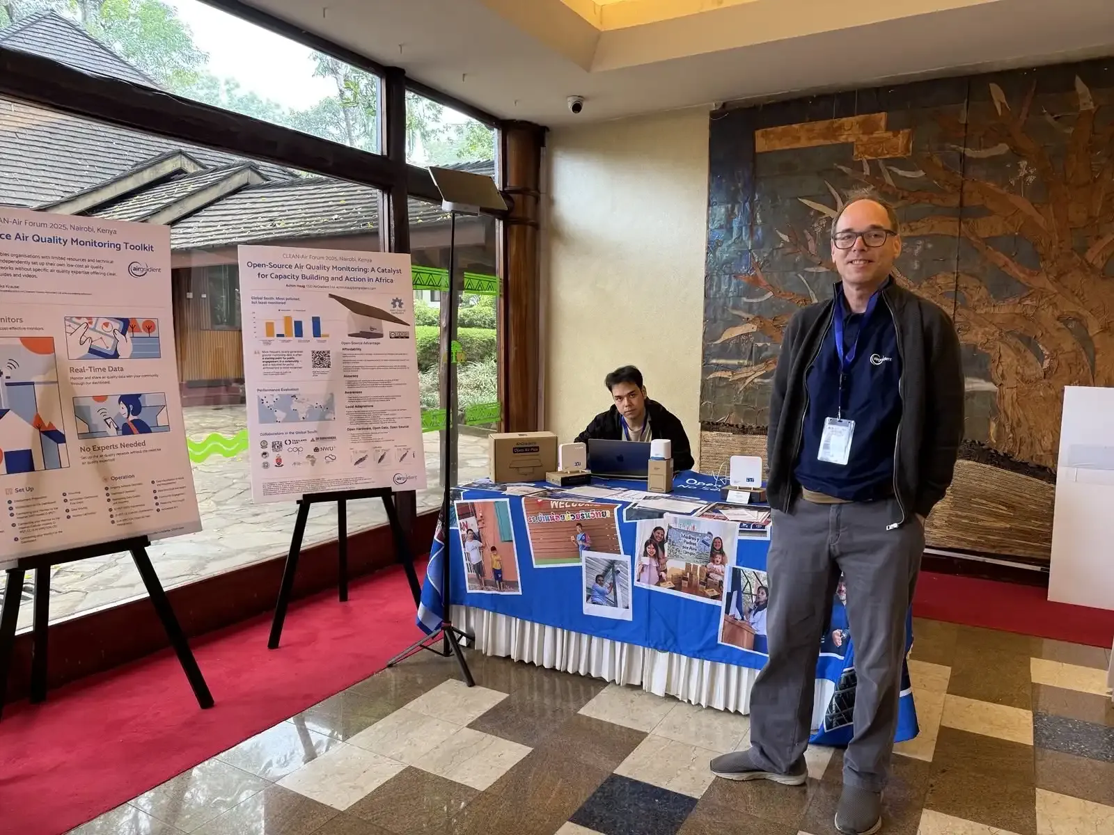 AirGradient exhibition table at the Clean Air Forum with open-source monitors on display